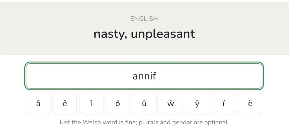 A drill's Recall stage: typing the Welsh for 'nasty, unpleasant' from memory, with buttons for â ê î ô û ŵ ŷ